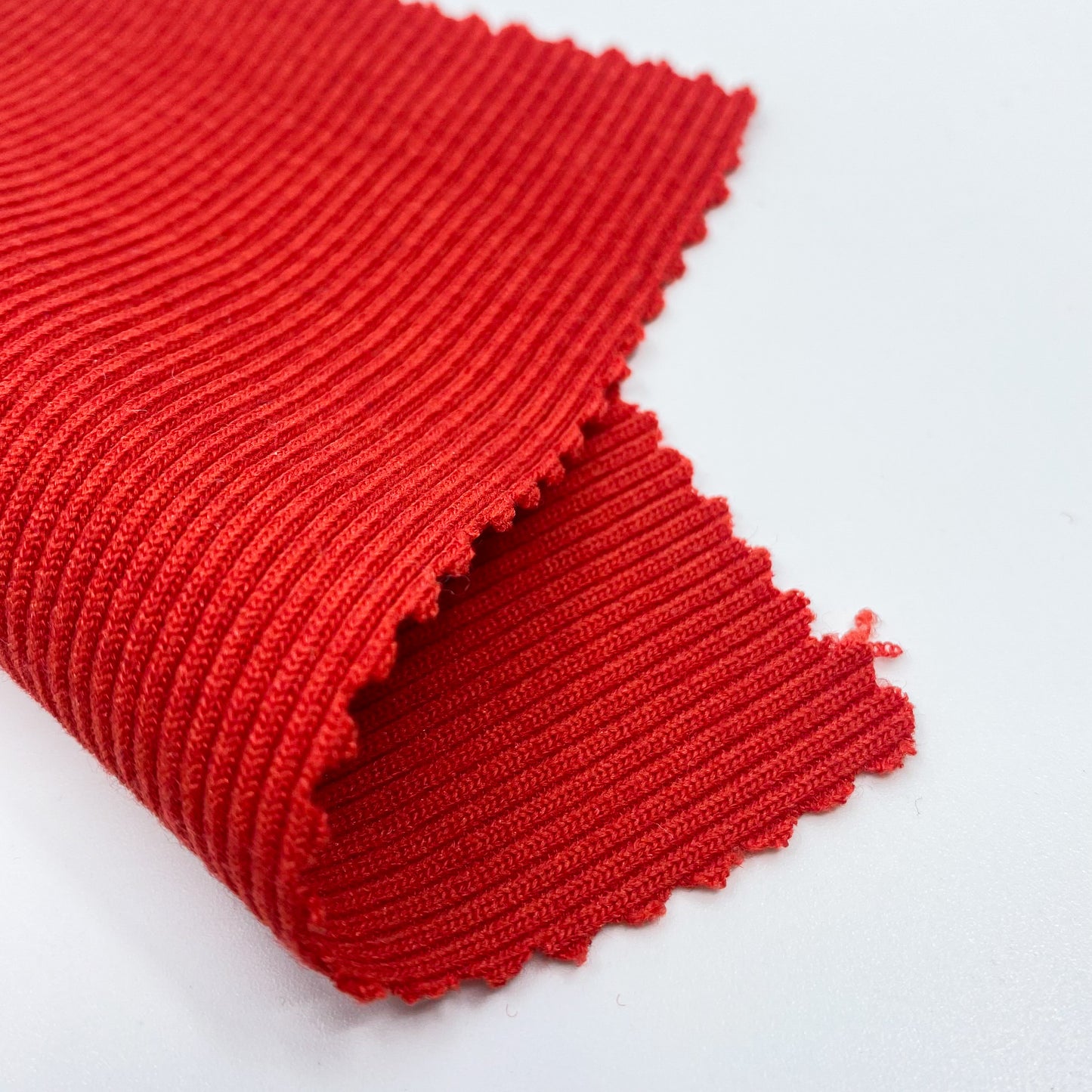 Maille - bord côte polyester rouge