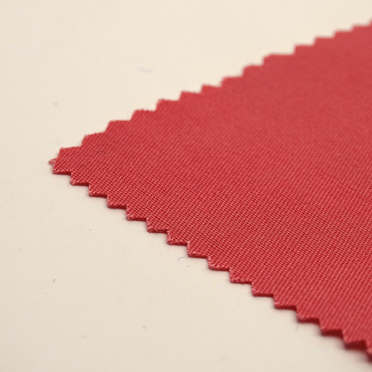 Tissu - Sergé défroissable polyester coton corail